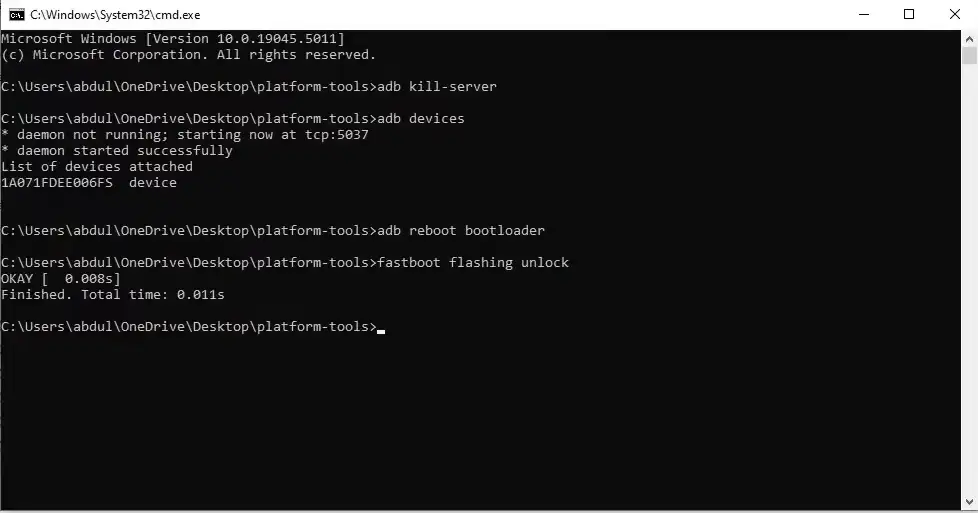 Fastboot command prompt showing 'fastboot flashing unlock' command to unlock Google Pixel bootloader